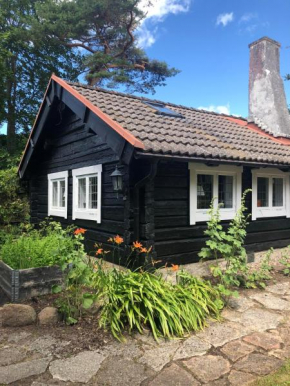 Havsnära 1700-tals Timmerstuga in Ängelholm